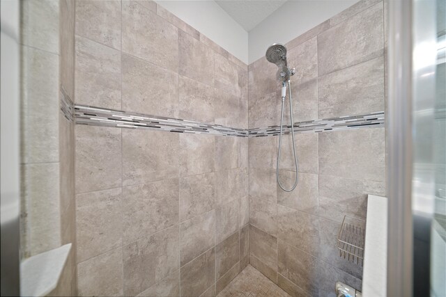 bathroom featuring tile patterned floors, vanity, and plus walk in shower