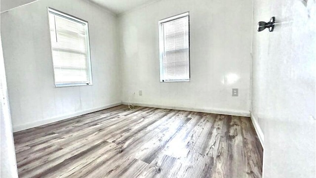 empty room featuring hardwood / wood-style floors