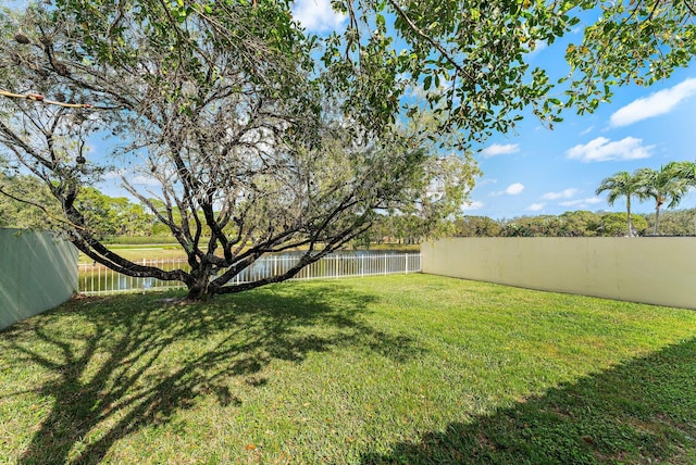 view of yard with a water view