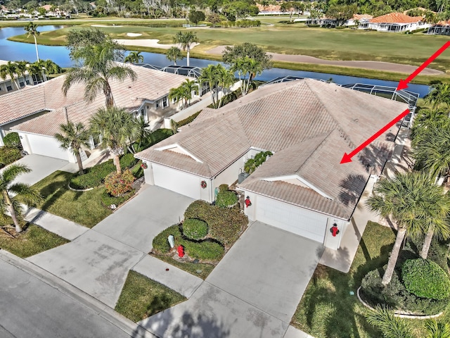 birds eye view of property featuring a water view