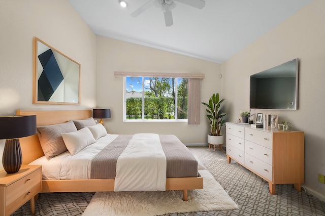 bedroom with light carpet, vaulted ceiling, a ceiling fan, and baseboards