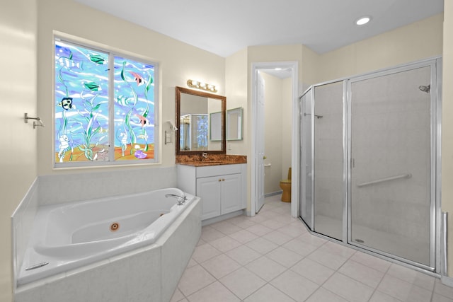 bathroom with a stall shower, toilet, a tub with jets, tile patterned floors, and vanity