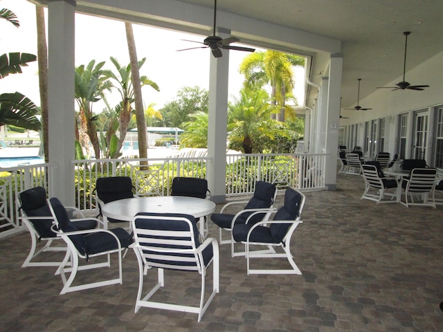 view of patio / terrace featuring ceiling fan