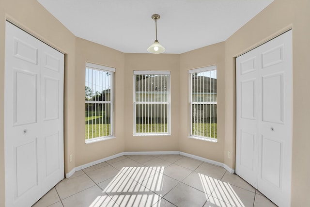 interior space featuring light tile patterned floors