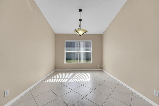 empty room with light tile patterned floors