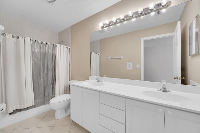 full bathroom featuring shower / bathtub combination with curtain, tile patterned flooring, a textured ceiling, toilet, and vanity