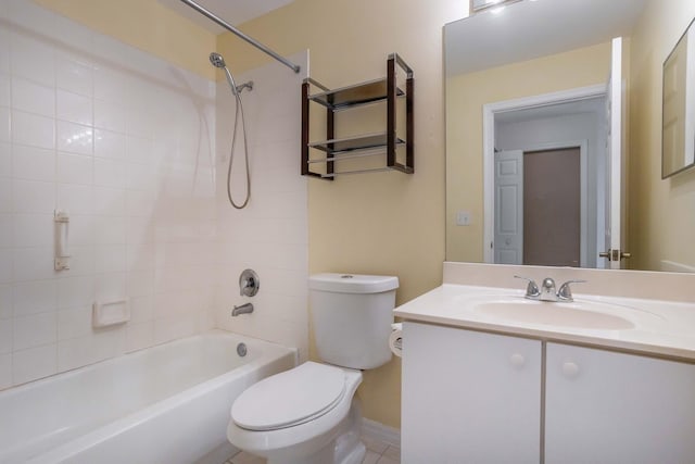 bathroom featuring toilet, washtub / shower combination, and vanity