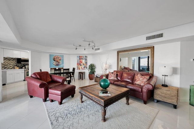 tiled living room with track lighting