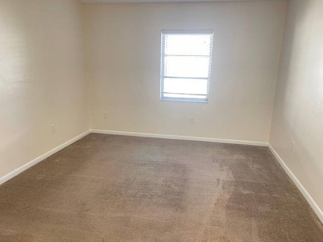 empty room with carpet floors