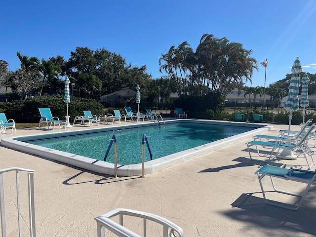 view of pool featuring a patio area