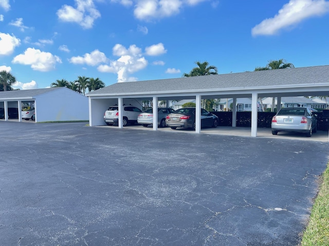 view of car parking featuring a carport