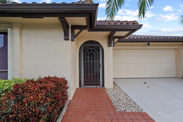 property entrance featuring a garage