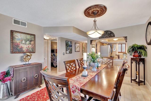 dining area featuring light hardwood / wood-style floors