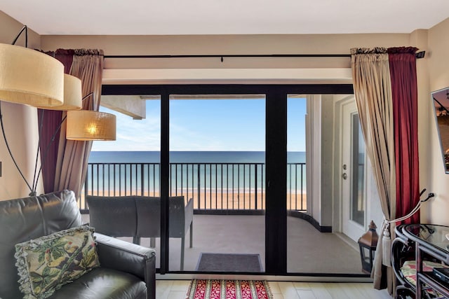 living room with a healthy amount of sunlight and a water view