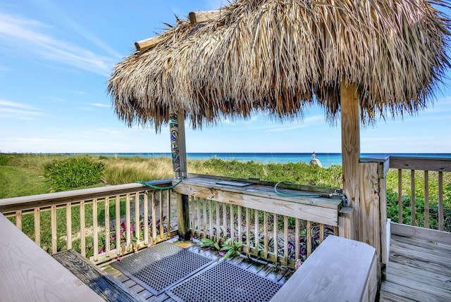 wooden deck with a water view