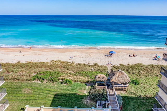 view of water feature featuring a view of the beach and a gazebo