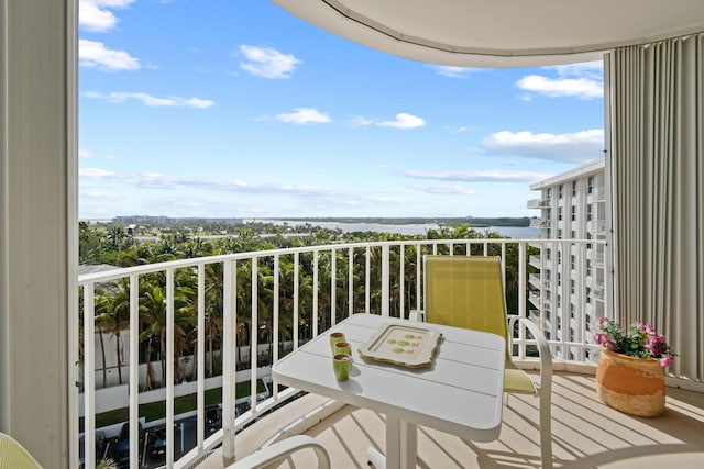 balcony featuring a water view