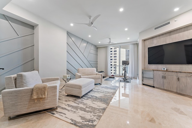 living room with ceiling fan