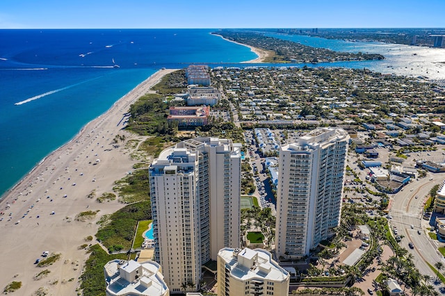 aerial view featuring a view of the beach and a water view