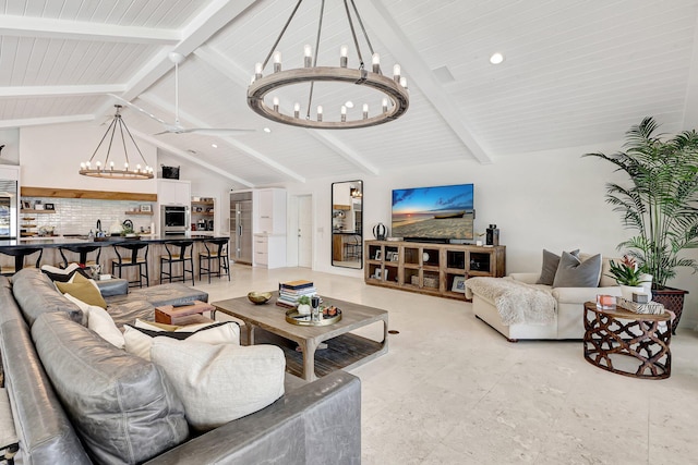 living room with vaulted ceiling with beams