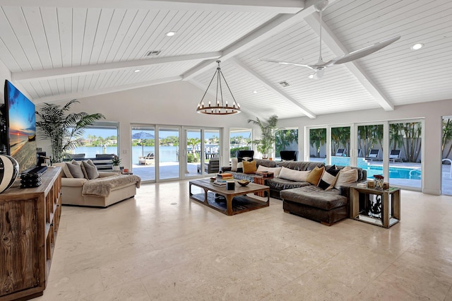 living room with beam ceiling, french doors, high vaulted ceiling, a water view, and ceiling fan with notable chandelier