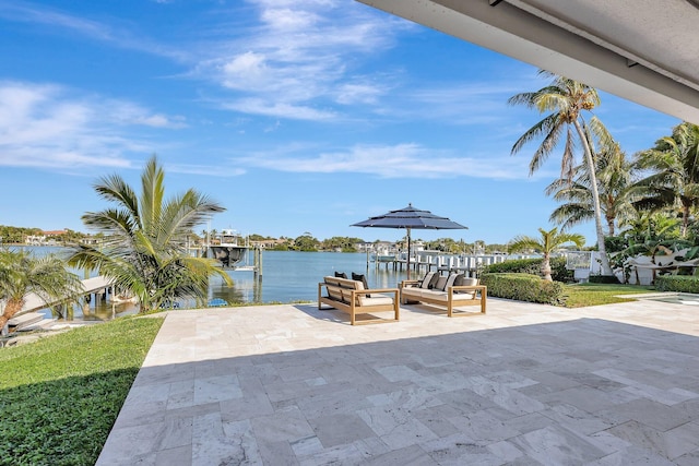 view of patio / terrace featuring a dock and a water view