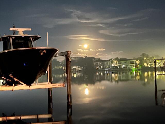 property view of water featuring a boat dock