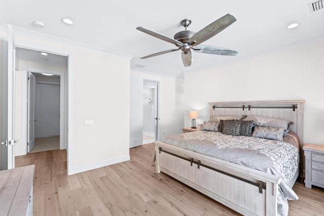 bedroom featuring light hardwood / wood-style floors, ceiling fan, and crown molding