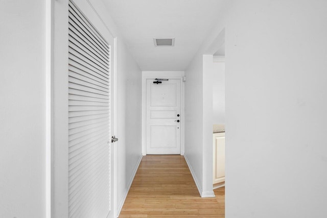 hall featuring light hardwood / wood-style floors