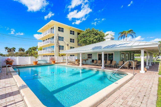 view of swimming pool featuring a patio