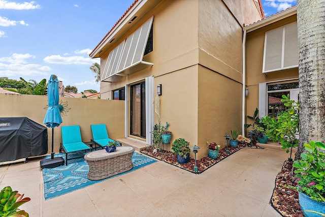 view of patio / terrace with a grill