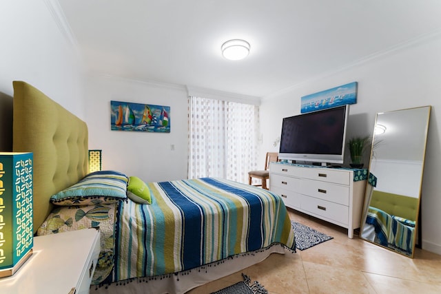 bedroom with light tile patterned floors and crown molding