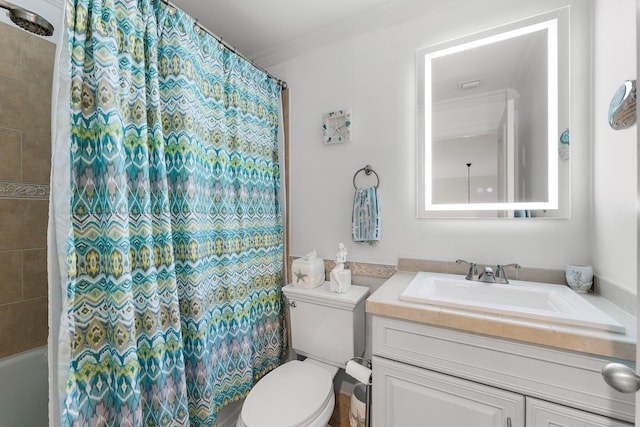 bathroom featuring vanity, toilet, and crown molding