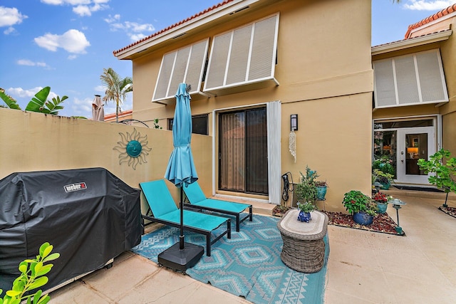 view of patio with a grill