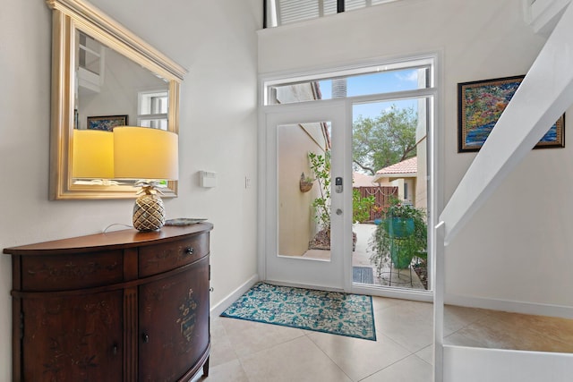 tiled foyer with french doors