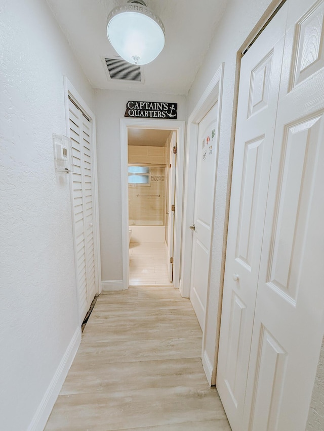 402 Shadow Wood Ln, Coral Springs, FL 33071 - hall featuring light wood-type flooring