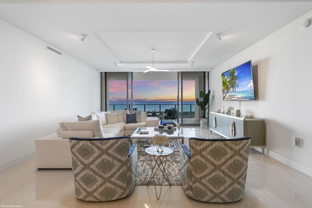 living room with a wall of windows