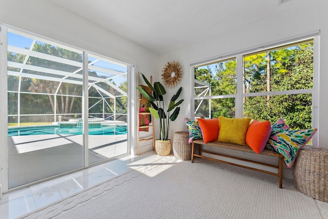 interior space featuring a pool and a wealth of natural light