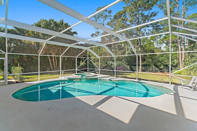 view of swimming pool with an in ground hot tub, a yard, a patio, and glass enclosure