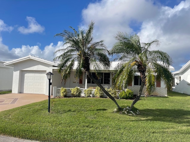 single story home with a garage and a front yard