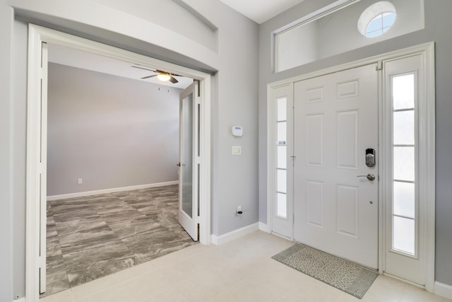 entryway featuring ceiling fan