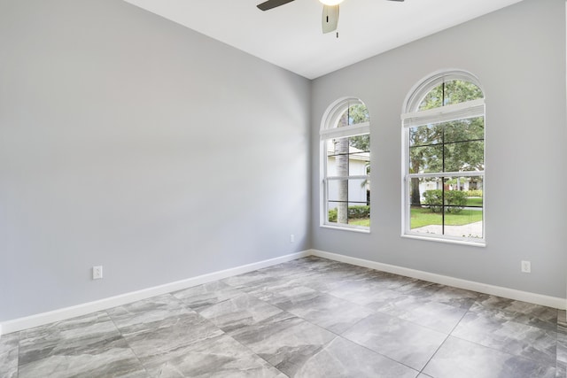 empty room featuring ceiling fan