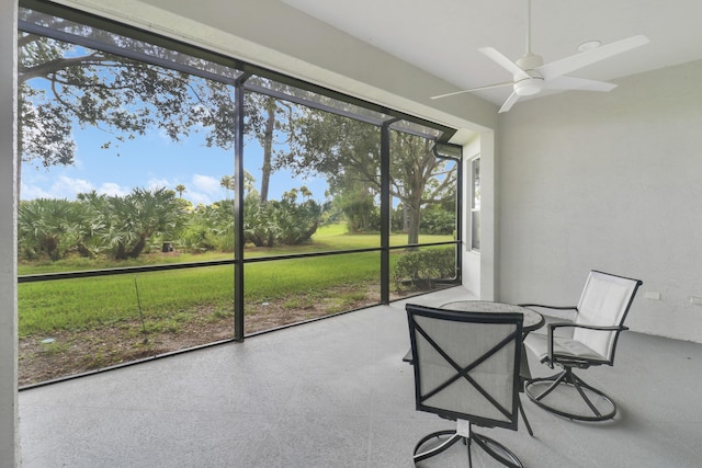 sunroom / solarium with ceiling fan