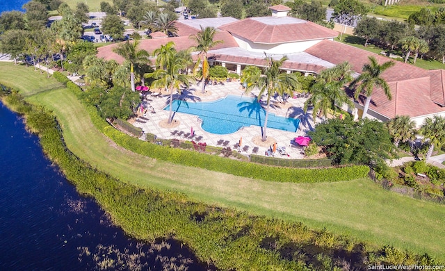 birds eye view of property featuring a water view