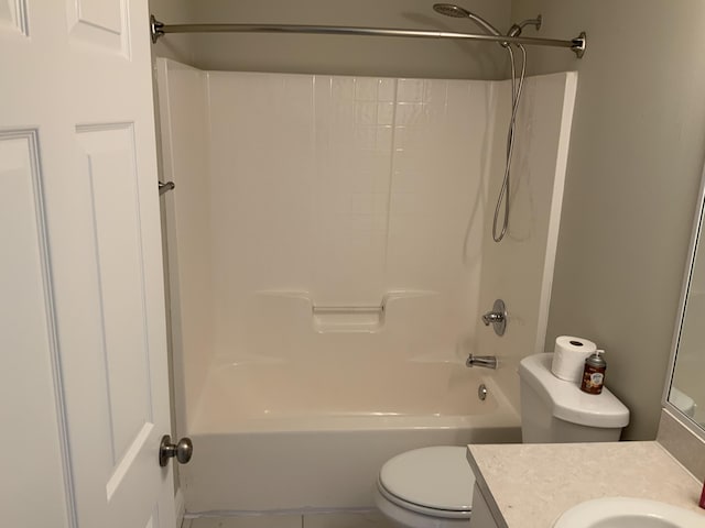 full bathroom featuring shower / bathing tub combination, vanity, and toilet