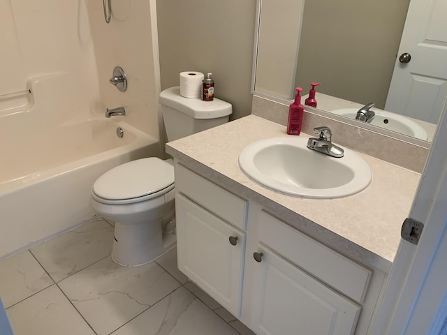 bathroom featuring toilet, marble finish floor, tub / shower combination, and vanity