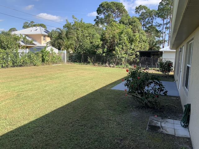 view of yard featuring a fenced backyard