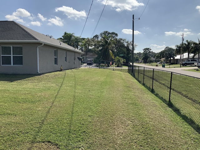 view of yard with fence