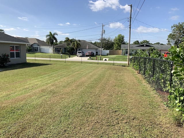 view of yard featuring fence