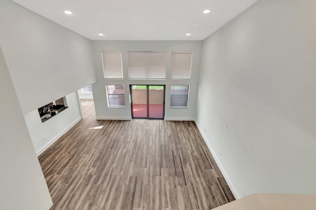 unfurnished living room featuring hardwood / wood-style floors